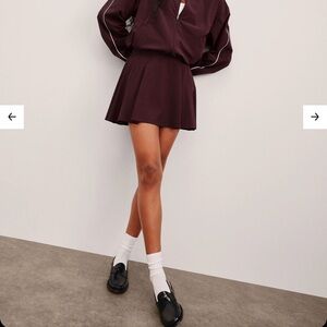 92. Beyond Yoga Score Pleated Tennis Skirt Dark Cherry Size M
